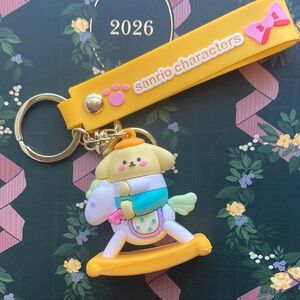 Pompompurin on Rocking Horse Keychain